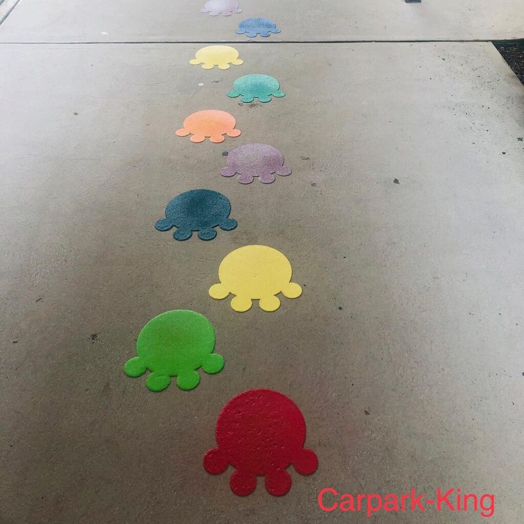 Coloured animal pawprints playground markings